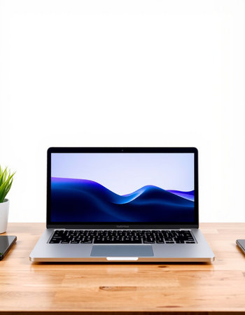 Laptop on wood desk with white wall background and copy space.