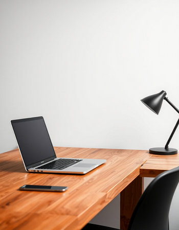 Side view of a modern workplace with a laptop, smartphone and a lamp. 3d rendering mock up
