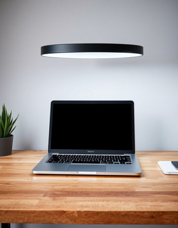 Laptop with blank screen on a wooden desk. 3d rendering