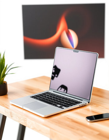 Laptop on a wooden desktop with a smartphone and a lamp. 3d rendering.の写真素材