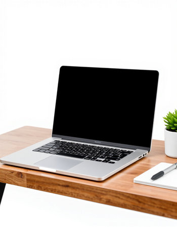 Laptop on wood table and white wall background, work from home concept