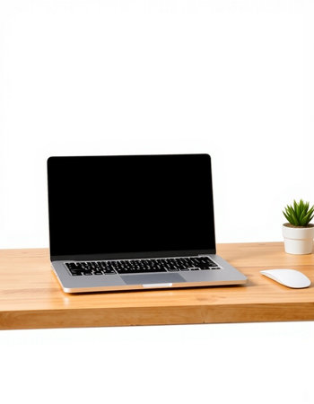 Laptop with blank screen on wooden desk isolated on white background.