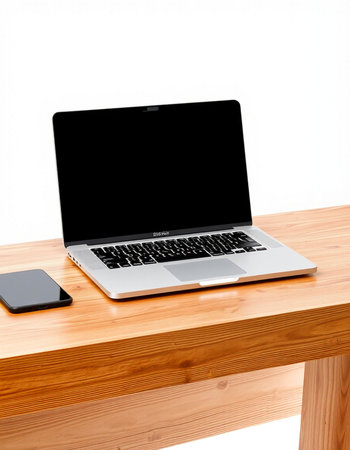 Laptop and smartphone on a wooden table isolated on white background.