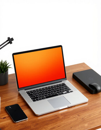 Laptop on wooden desk isolated on white background.