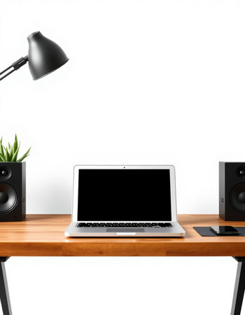 Modern workspace with blank screen laptop computer on wooden table and white wall background