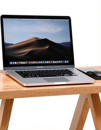 laptop on wooden desk with desert landscape on screen. 3d rendering.