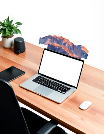 Modern workplace with blank screen laptop computer on wooden desk, clipping path included