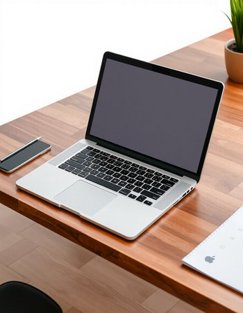 Laptop with blank screen on wooden table. Mockup for design