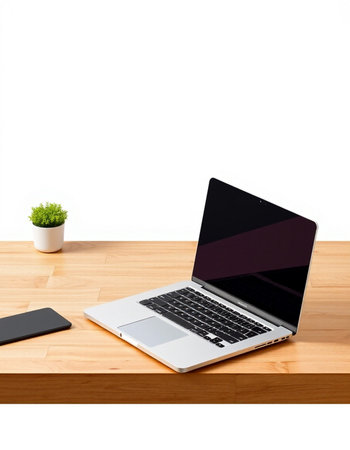 Laptop computer on wooden desk isolated on white background with clipping path