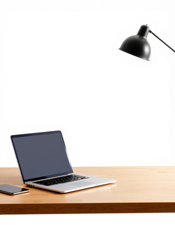 Laptop and smart phone on wooden desk isolated on white background.