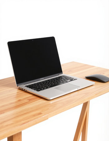 Laptop computer on wooden desk isolated on white background with clipping path
