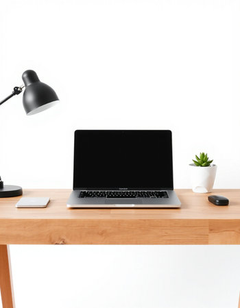 Laptop with black screen on wooden desk and lamp on white wall background