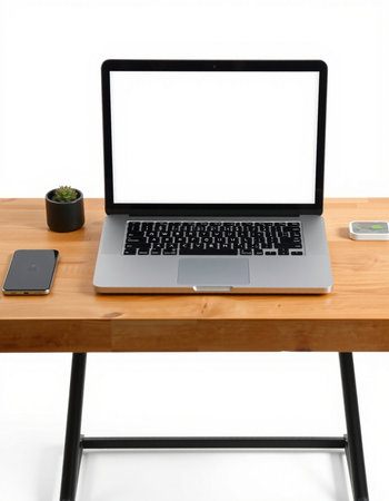 Laptop computer with blank screen on wooden table isolated on white background