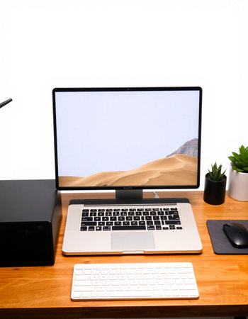 Working space with computer and mouse on the wooden desk with white background
