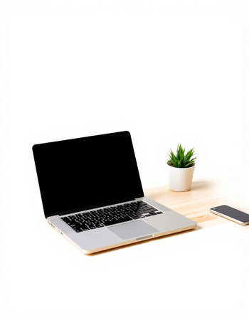 Laptop computer with blank screen on wooden desk isolated on white background