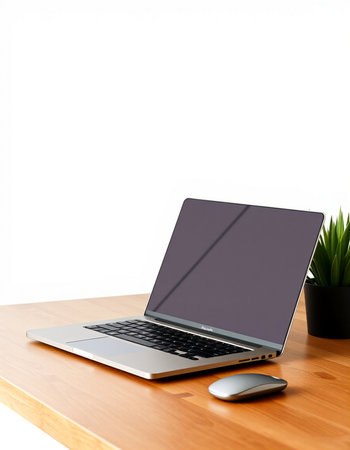 Laptop computer with blank screen on wood table isolated on white background