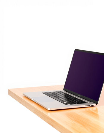 Laptop computer on wooden desk isolated on white background with clipping path