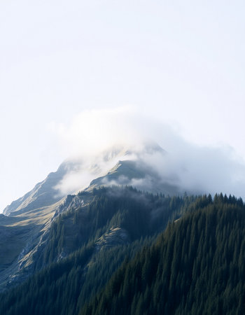 Mountain landscape with fog and clouds.