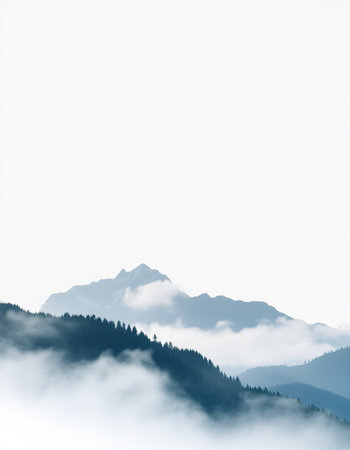 Foggy mountain landscape with blue sky and white clouds background.