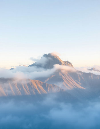 Mountains in clouds at sunrise. Caucasus, Georgia, region Gudauri.