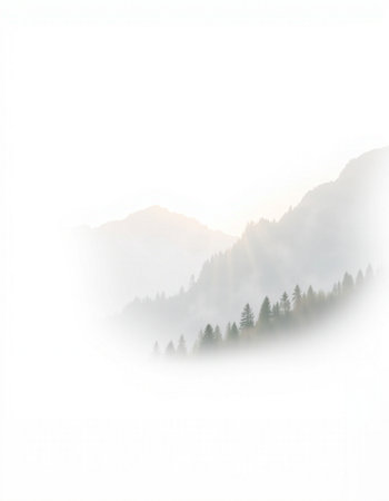 Mountain landscape with fog and sunbeams on a misty morning
