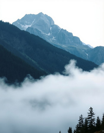 Mountain landscape with clouds and fog in the mountains. Caucasus, Russiaの写真素材