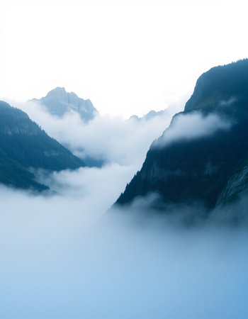 Mountain landscape with clouds and fog in the italian alps