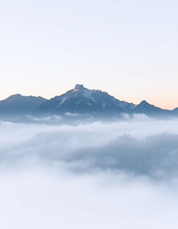 Mountains in the fog in the morning. Caucasus, Russia.