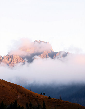 Mountains in the fog with copy space. Mountain landscape on a white background.