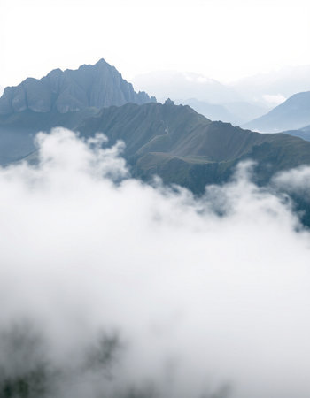 Mountain landscape with clouds and fog. Caucasus Mountains, Georgia.
