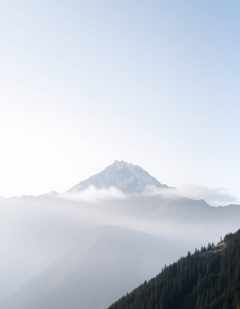 Mountain landscape with fog in the morning. Caucasus Mountains, Georgia.の写真素材