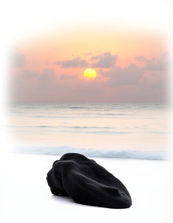 Sleeping bag on the beach with sea and sunset background.の写真素材