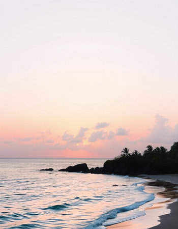 Beautiful sunset on the beach with palm trees, sea and sky