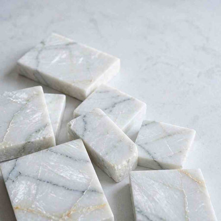 White marble barsle background. Top view, copy space.