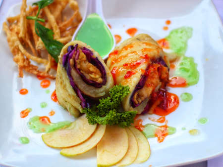 Fried Apple Roll with Fresh Apple Sauceの写真素材