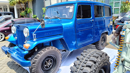 Batu City, East Java Province, Indonesia - November 2022 :  Blue Jeep Classic Car Parked in Automotive Contestのeditorial素材