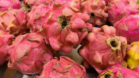 flat lay photography of fresh dragon fruit in market stallの写真素材