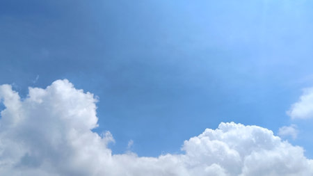 Sunny Blue Sky with clouds background, Copy Space For Textの写真素材