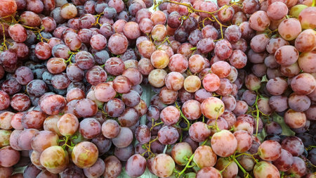 High Angle View of Fresh grapes at fruit marketの写真素材