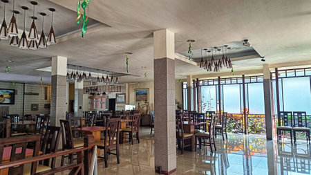 classic restaurant interior space with wooden seatingの写真素材