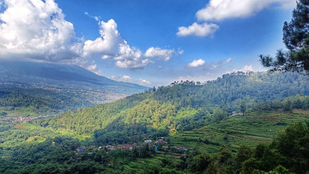 top view of village landscape with blue sky and white clouds