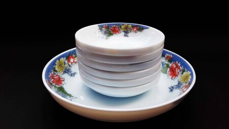 crockery bowls isolated on black background