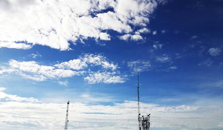 white fluffy clouds in blue sky closeup image