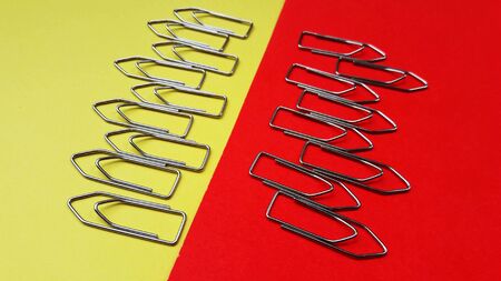 paper clip on color background with text space