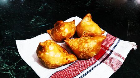 indian wheat flour and potato snacks closeup