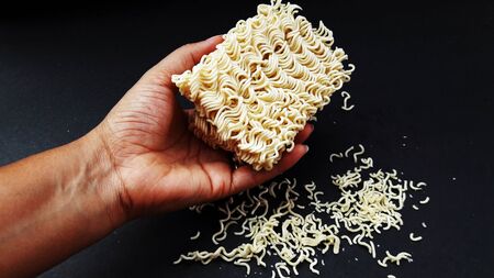 raw noodle isolated on black background