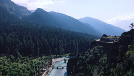 Mountain landscape with a river in the foreground, view from above