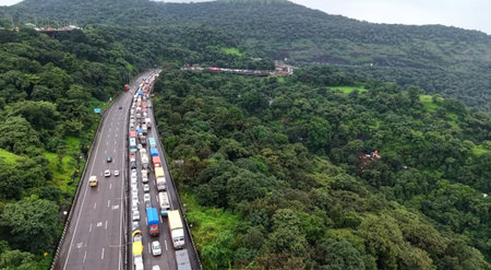Aerial view of highway with cars on the road in Thailand.
