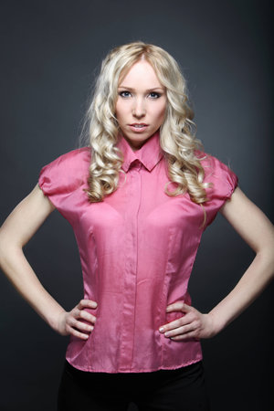 Studio shot of a beautiful young wonam on dark backgroundの写真素材