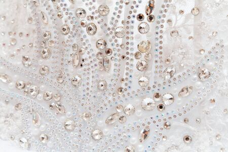 wedding dress with jewels close-upの写真素材